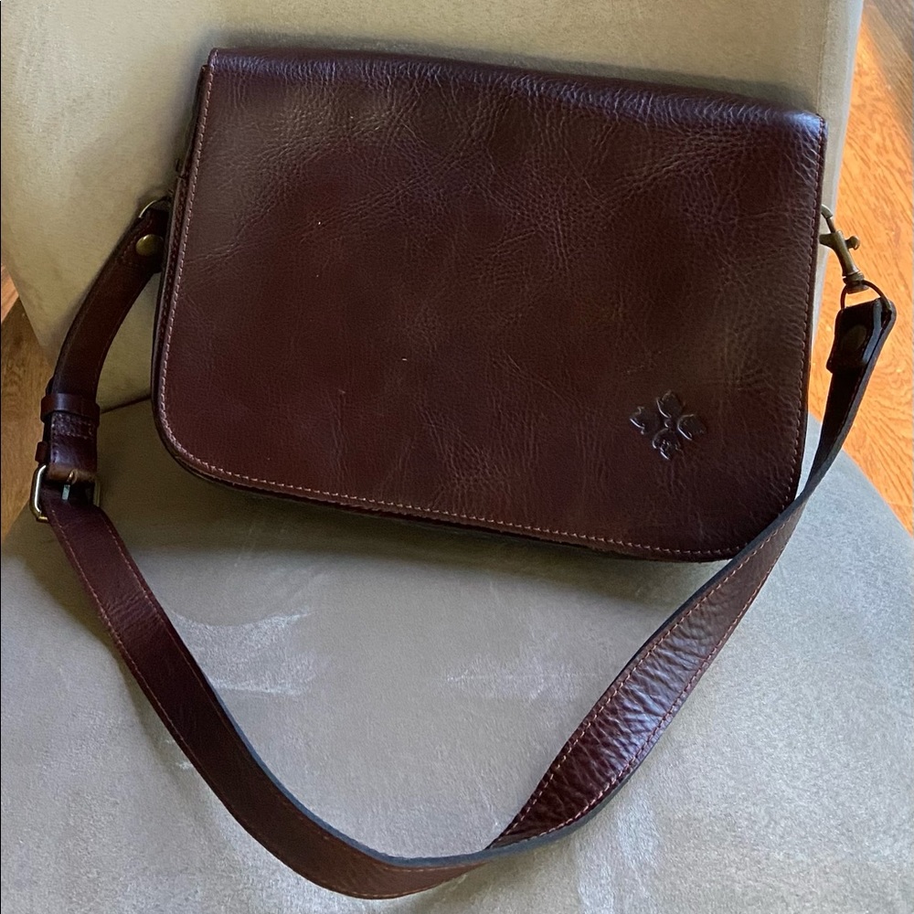Leather shoulder bag by Patricia Nash